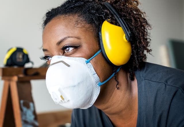 Woman wearing personal protective equipment