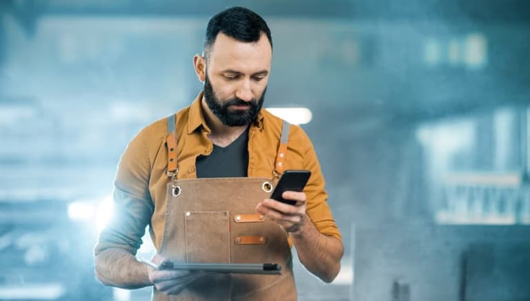 Employee reporting incident on mobile phone