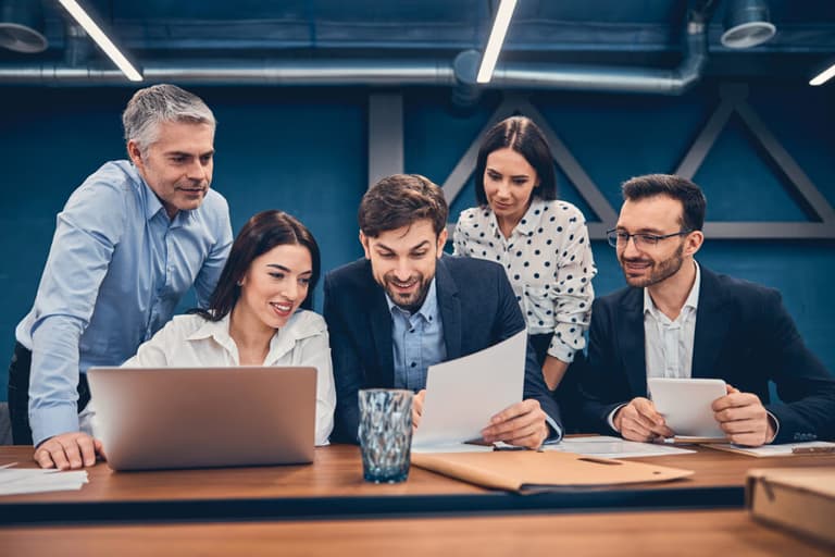 Employees engaging in a productive business strategy discussion