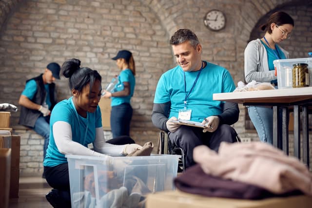 Volunteers at homeless charity