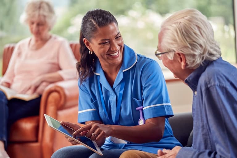 care provider explaining CQC 5 standards
