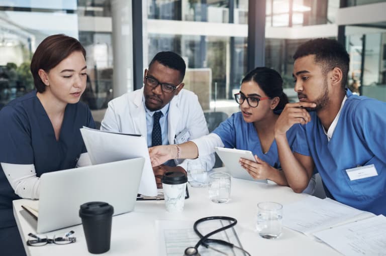 Group of nurses and doctors having a meeting